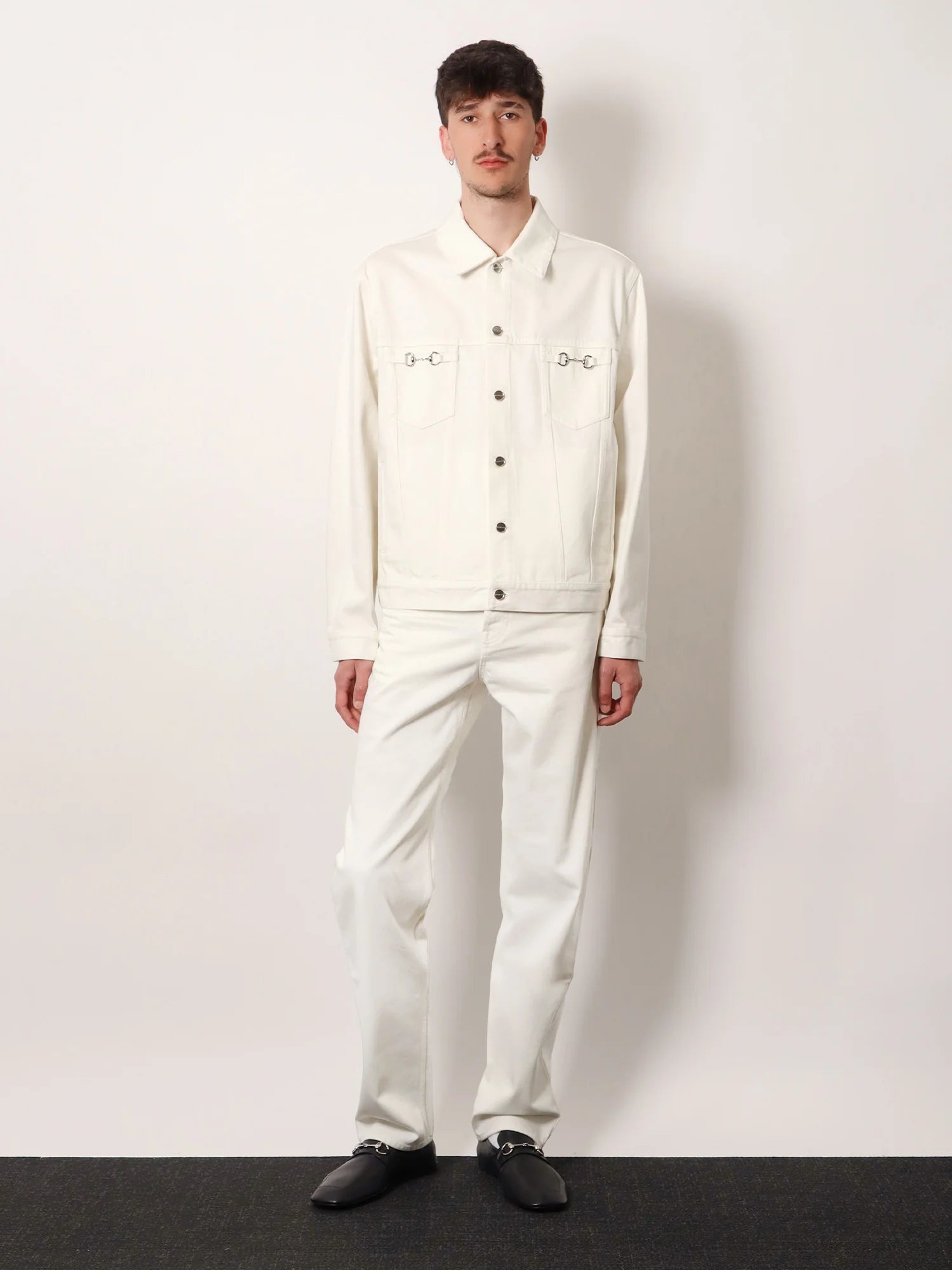 Denim trousers with metal Horsebit detail on the back
