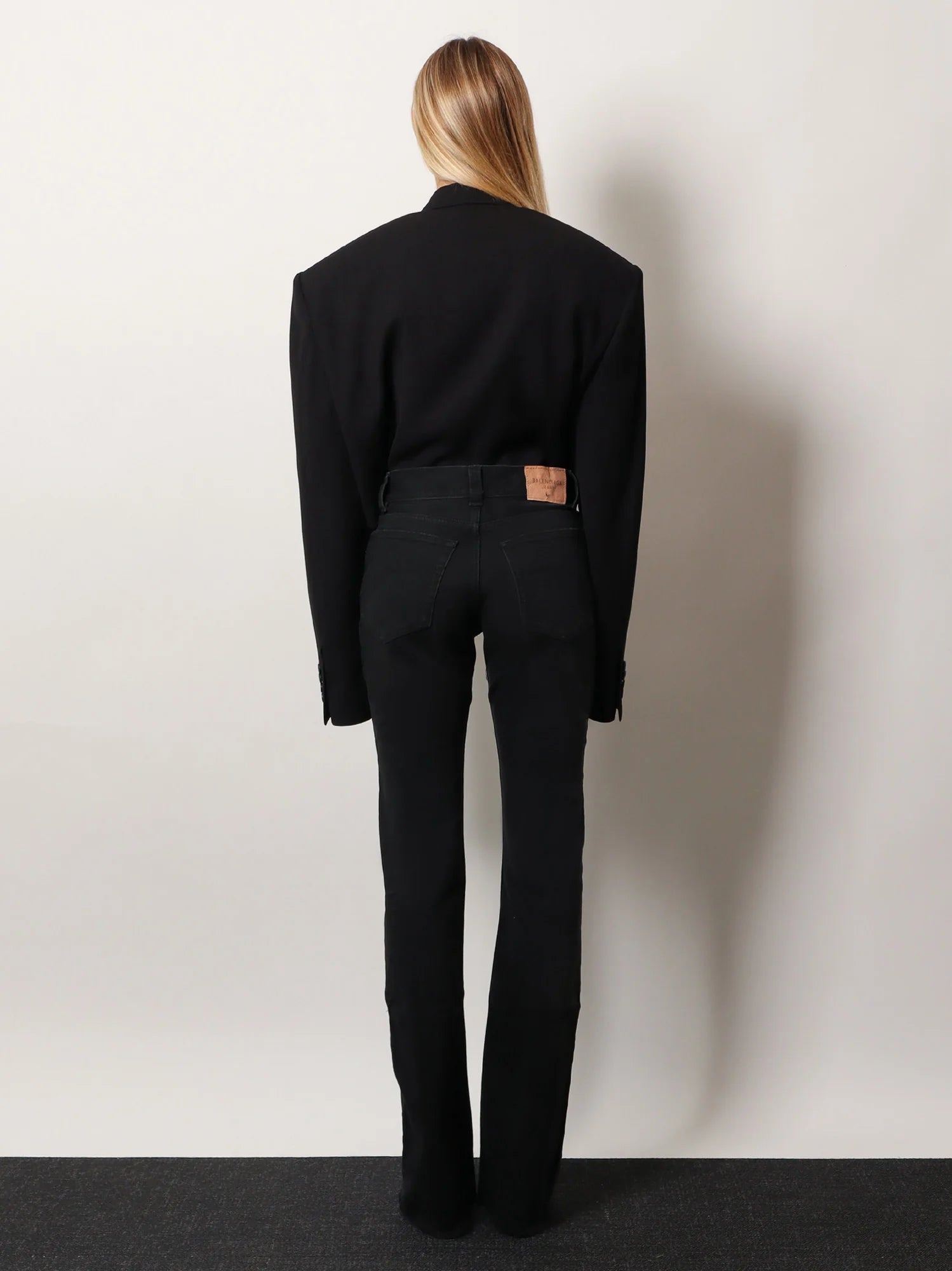 Denim trousers with frayed edges