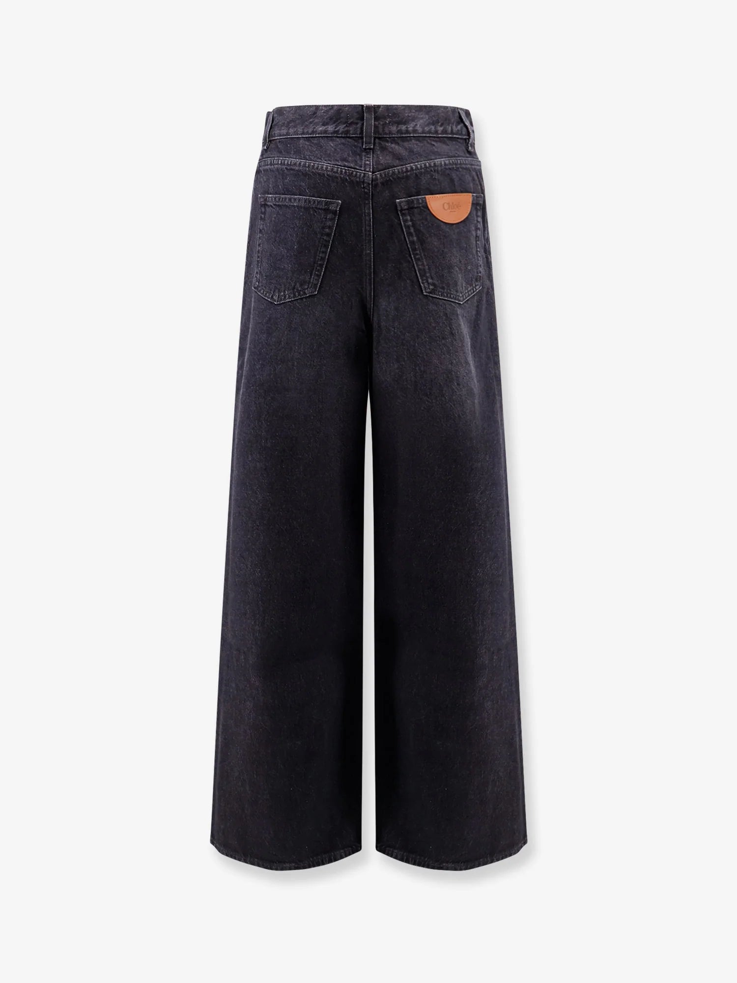 Jeans with iconic leather logo tag