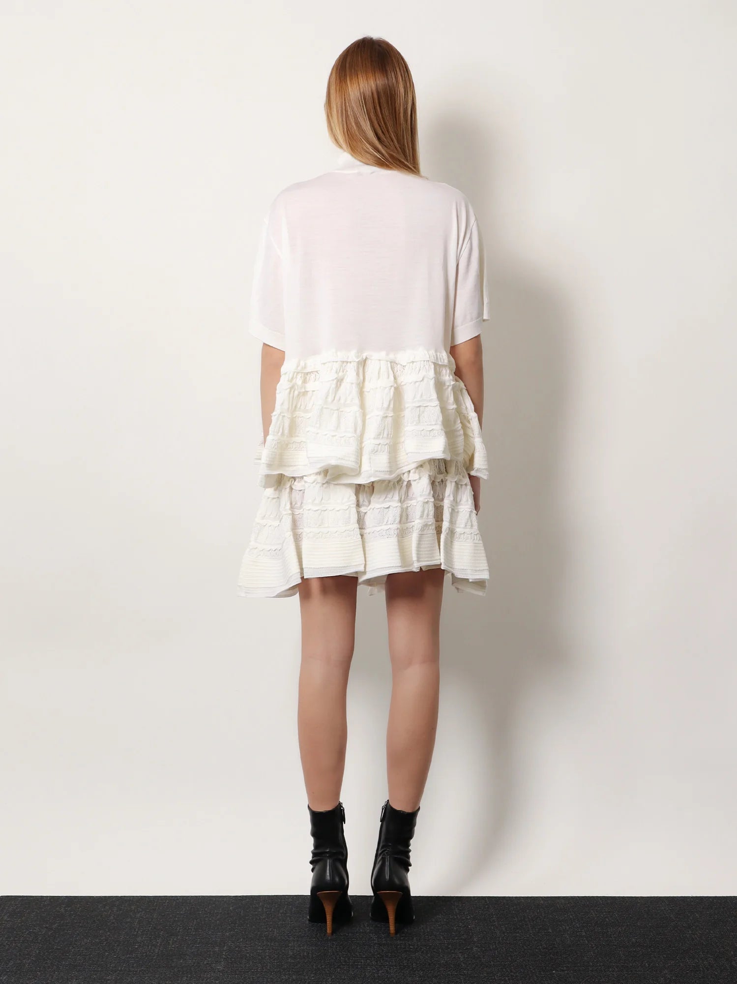 Peplum virgin wool sweater