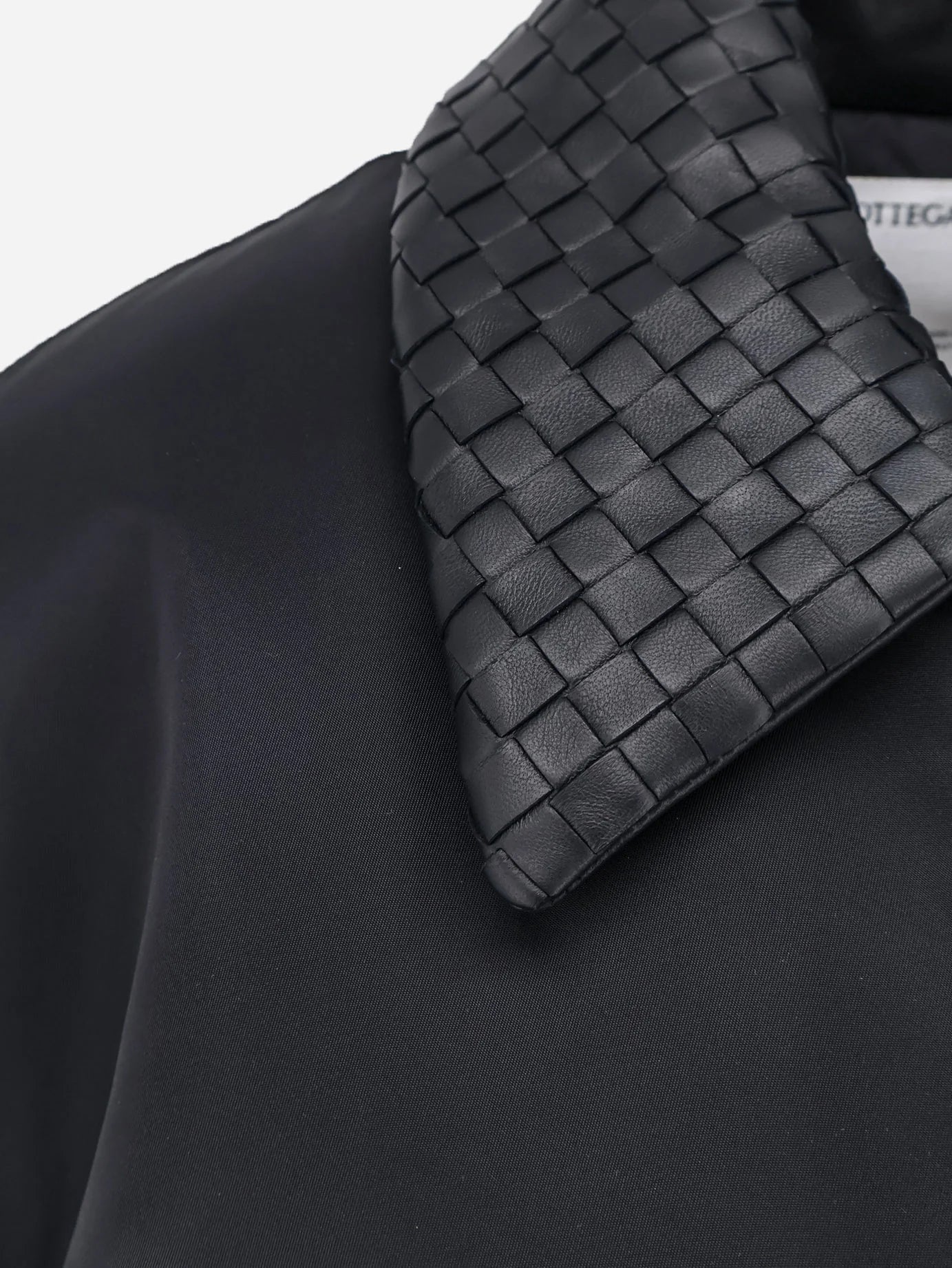 Nylon jacket with Intrecciato leather collar