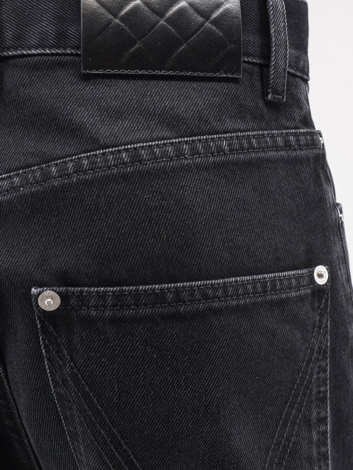 Black denim trousers