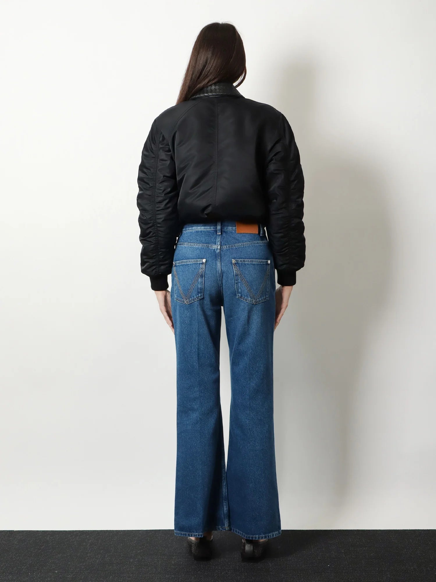 Black denim trousers
