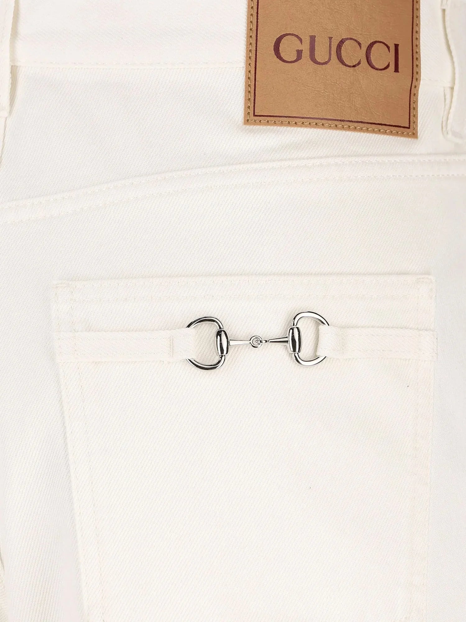 Denim trousers with metal Horsebit detail on the back