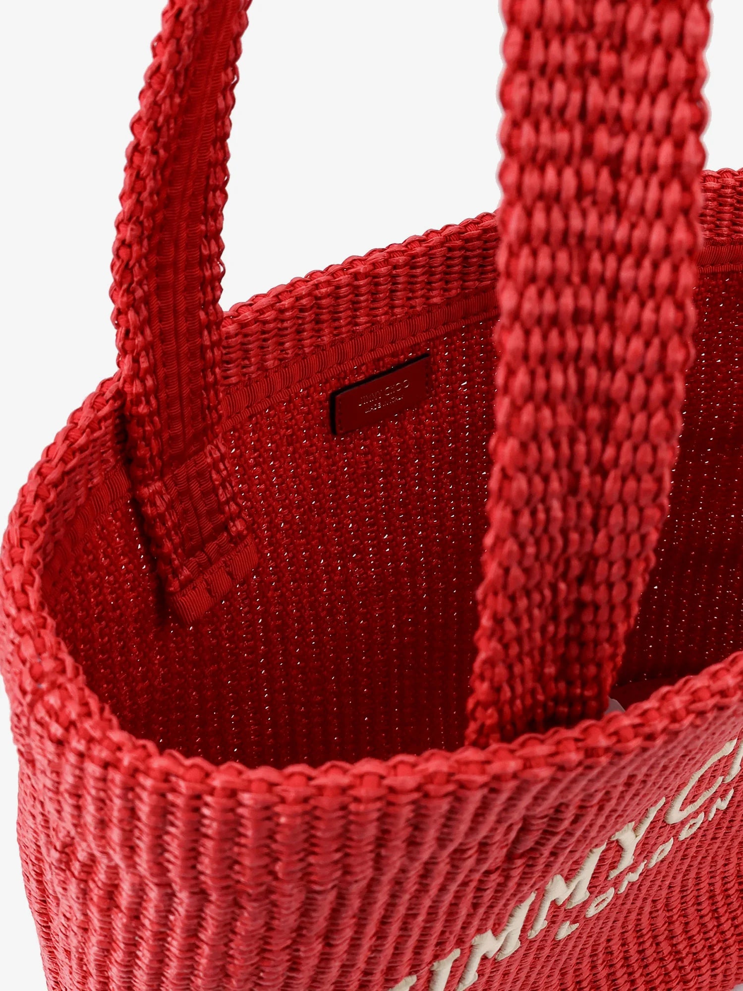 Raffia shopping bag with lettering logo on the front