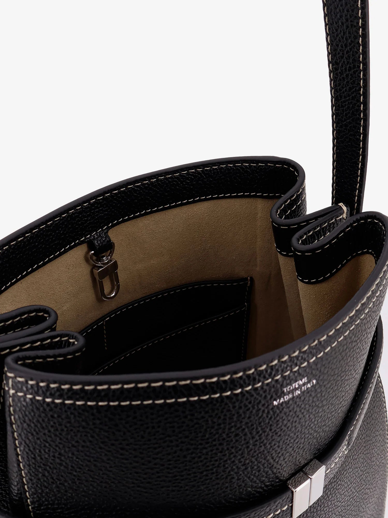 Hammered leather bucket bag with strap on the front