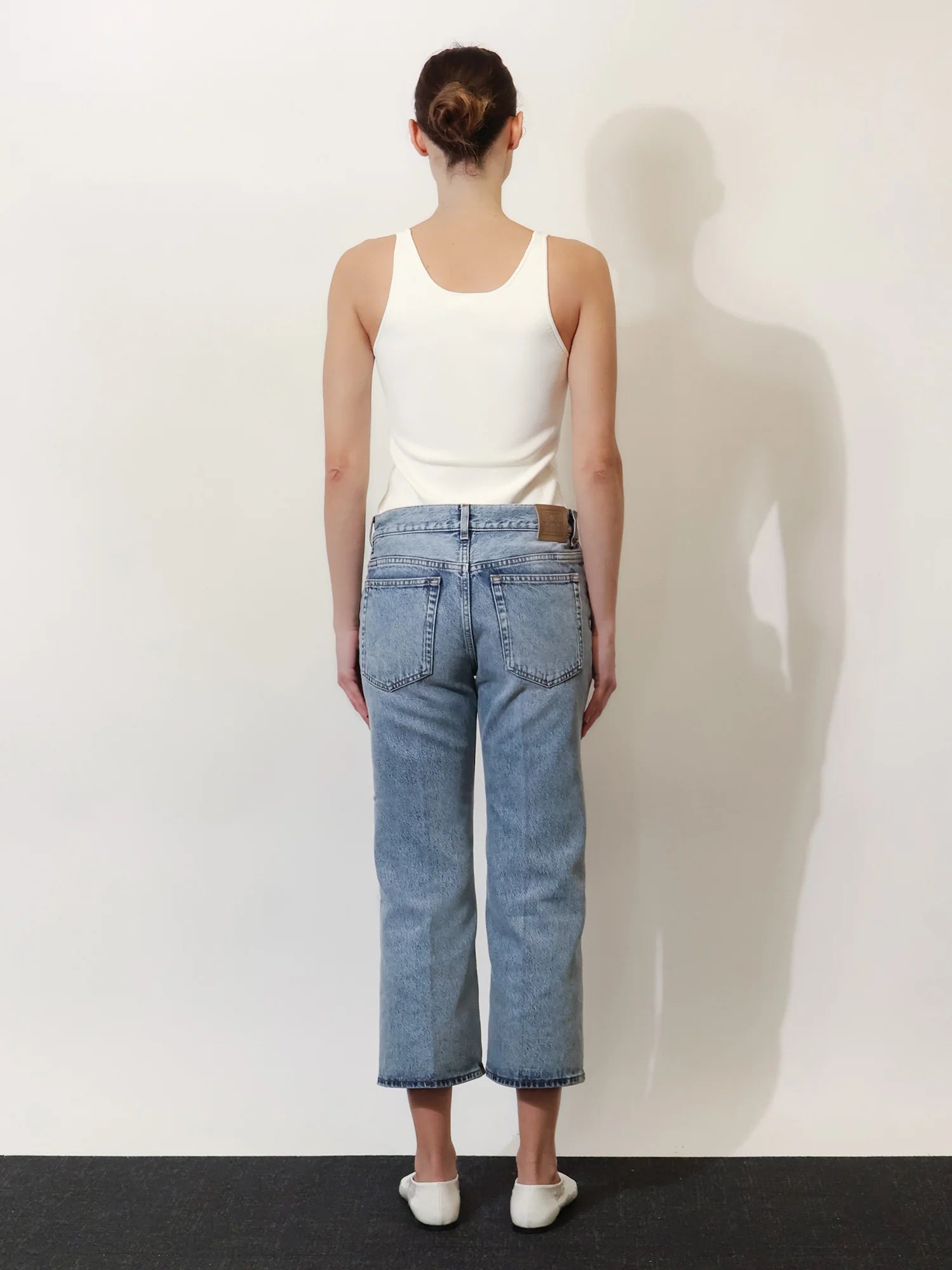 White denim trousers with flared bottom