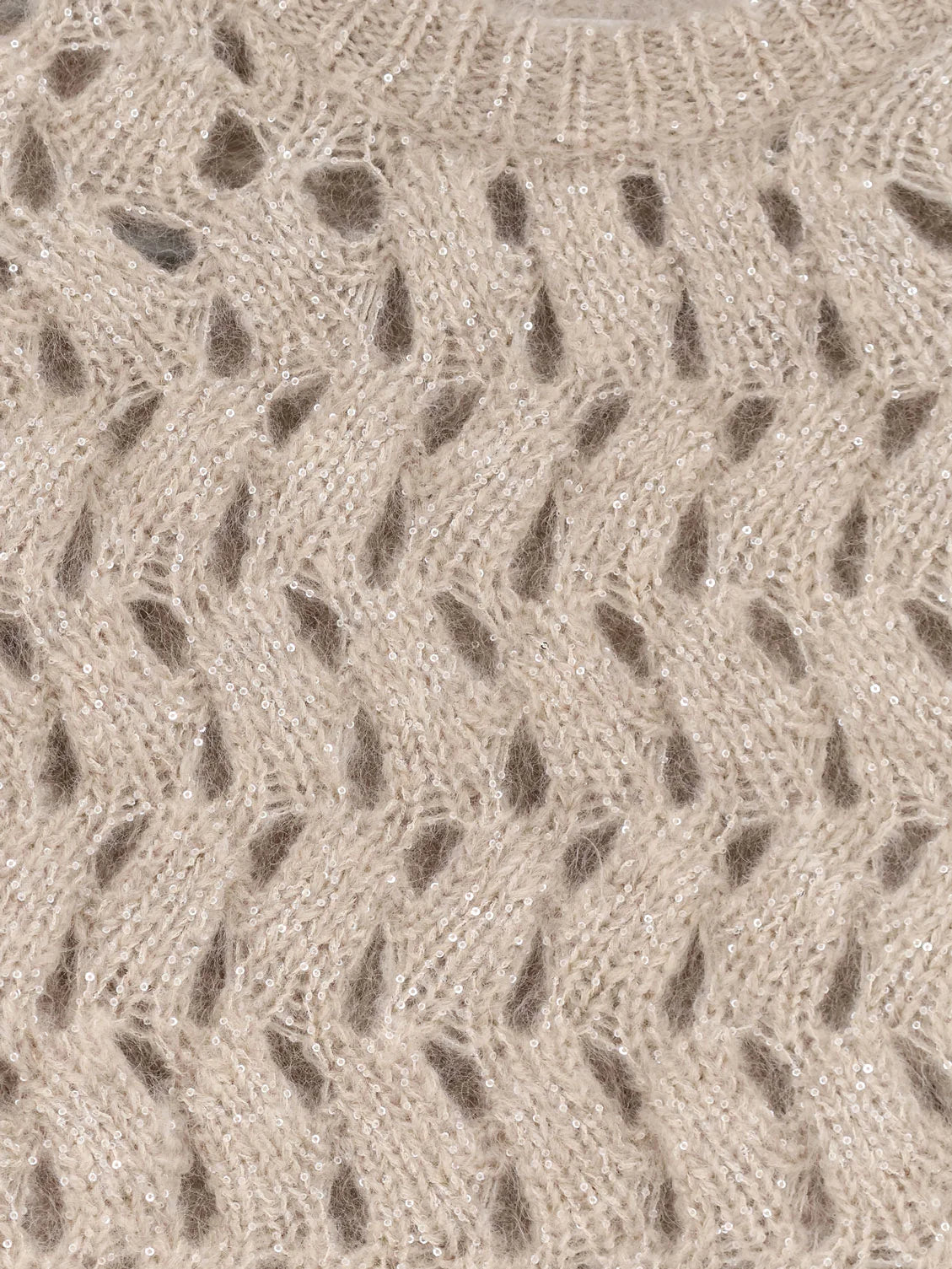 Perforated sweater with micro sequins