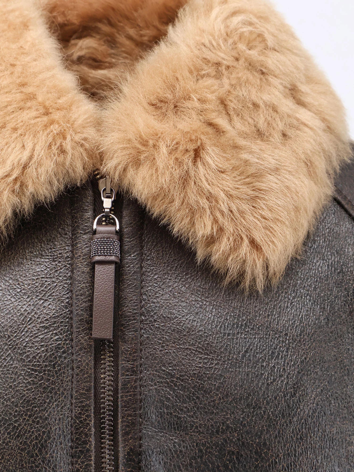 Leather jacket with shearling collar