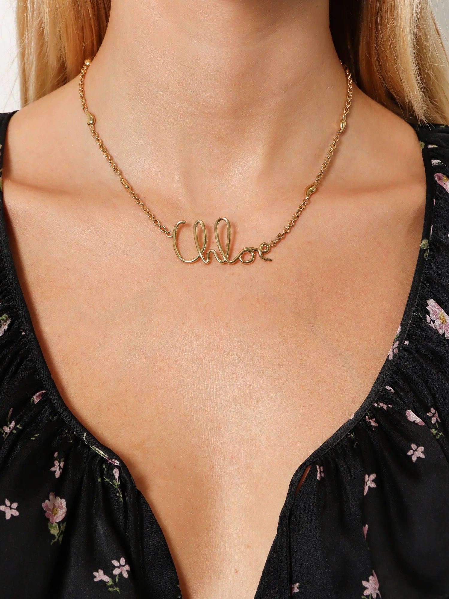 Brass necklace with lettering logo