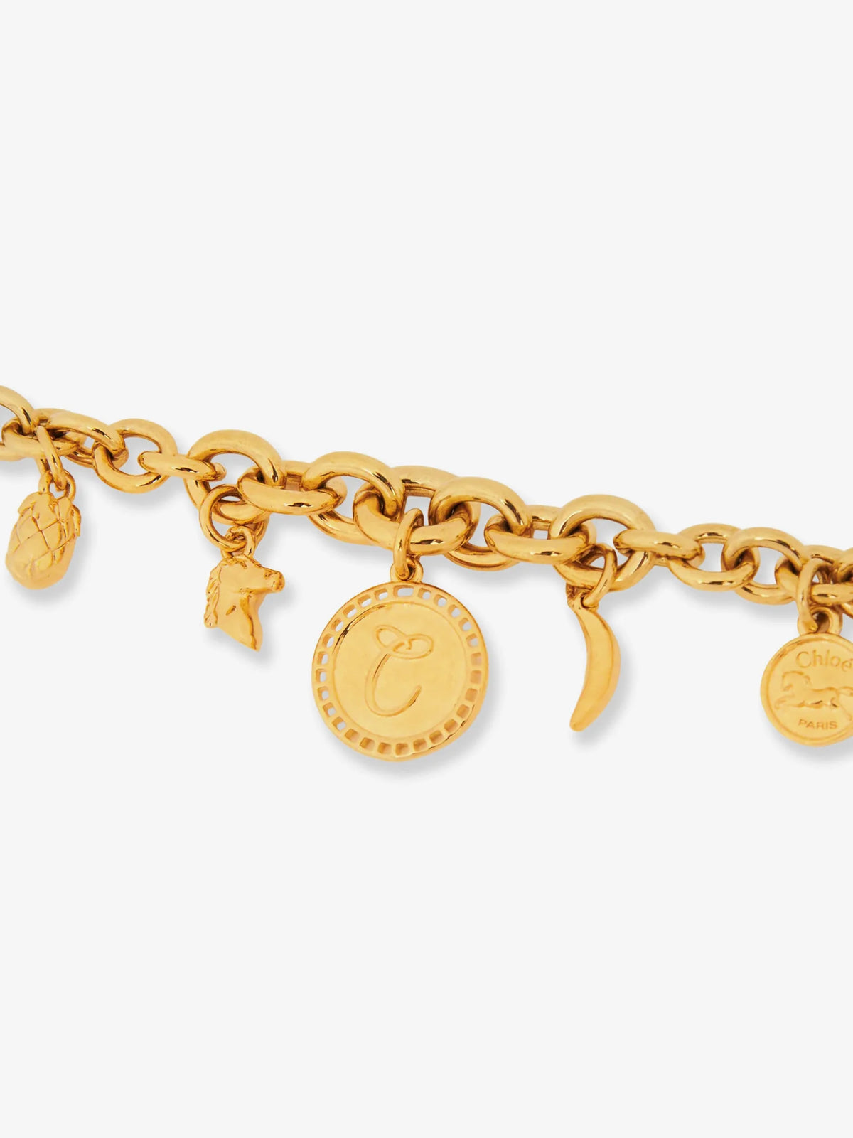 Brass bracelet with charms