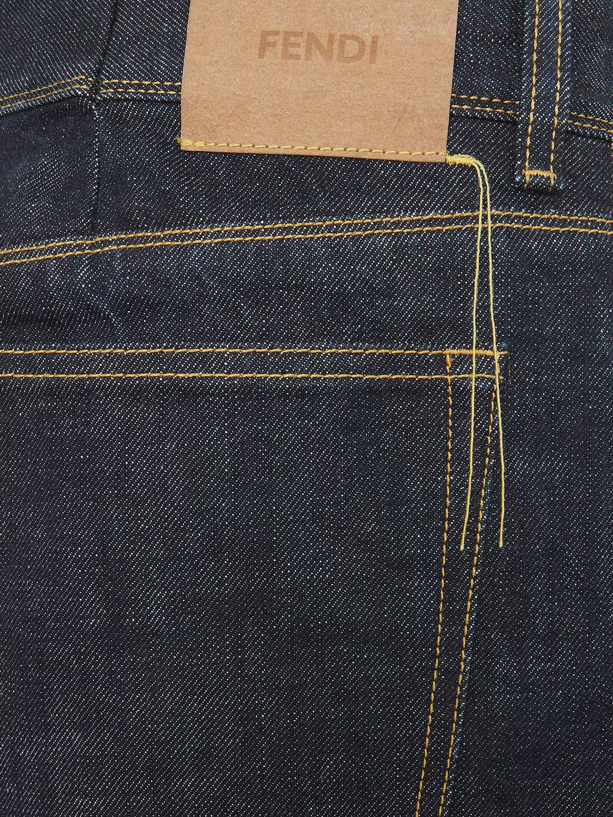 Navy blue five-pocket full-length jeans