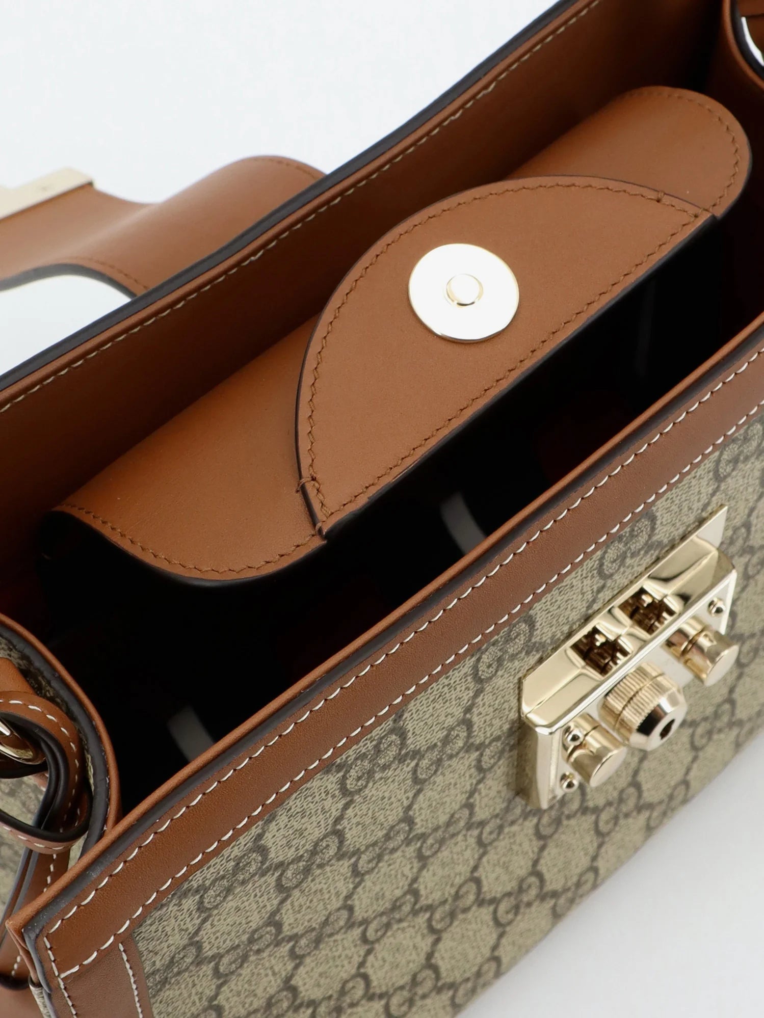 Padlock handbag with shoulder strap