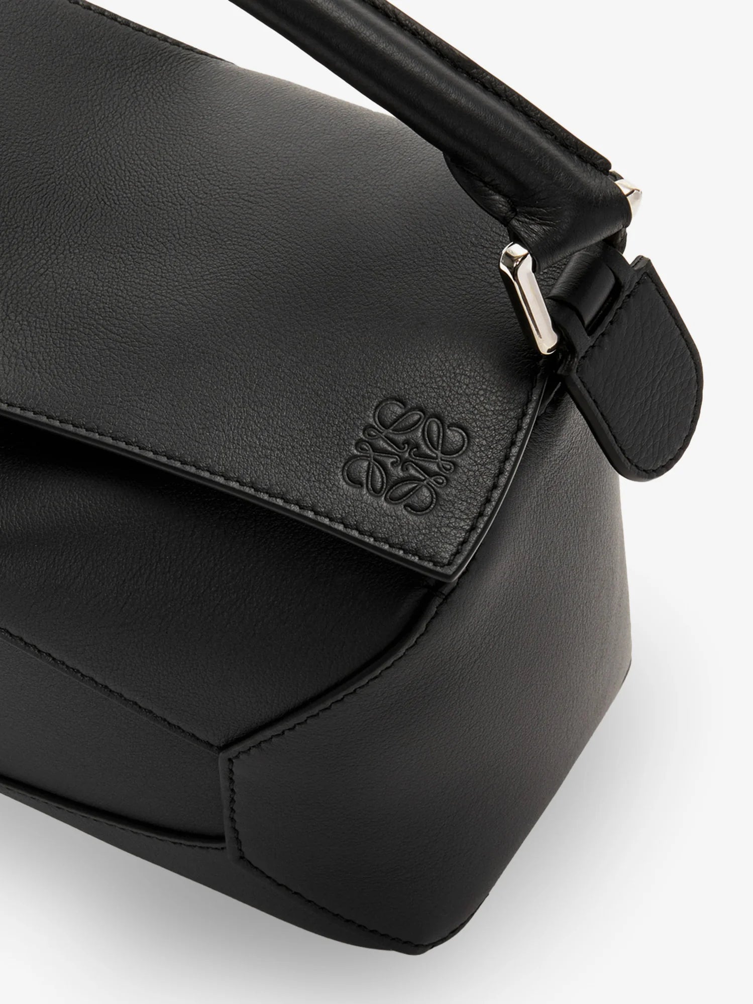Puzzle Edge leather handbag with engraved Anagram logo