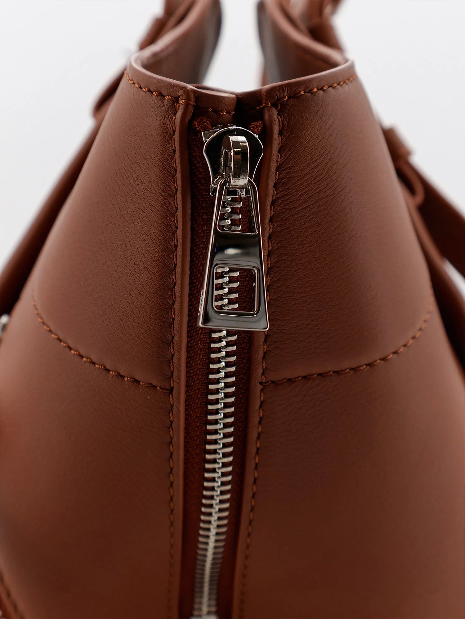 Hammock Flip leather handbag with front lettering logo