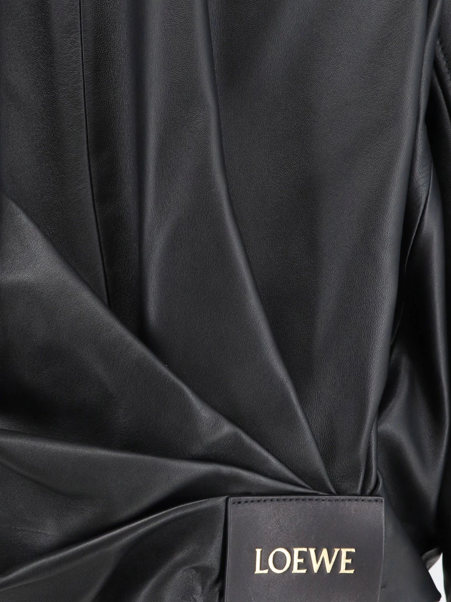 Cropped leather jacket with back logo patch