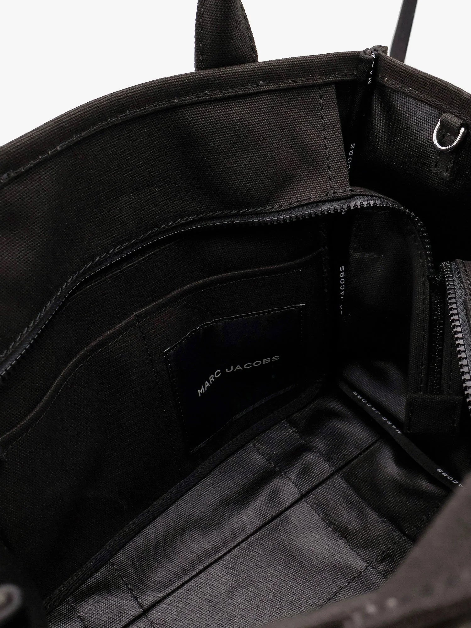 The medium tote canvas crossbody bag
