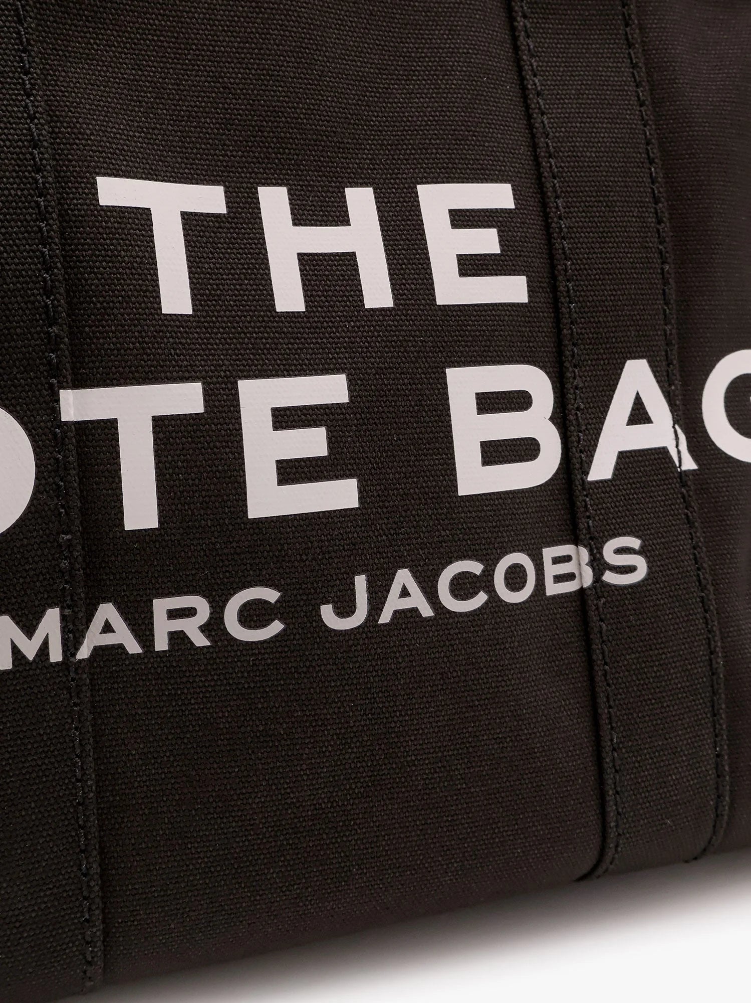 The medium tote canvas crossbody bag
