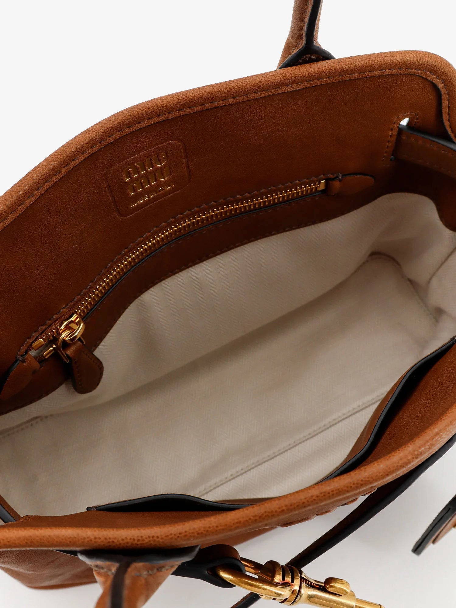 Aventure leather handbag with embossed lettering logo