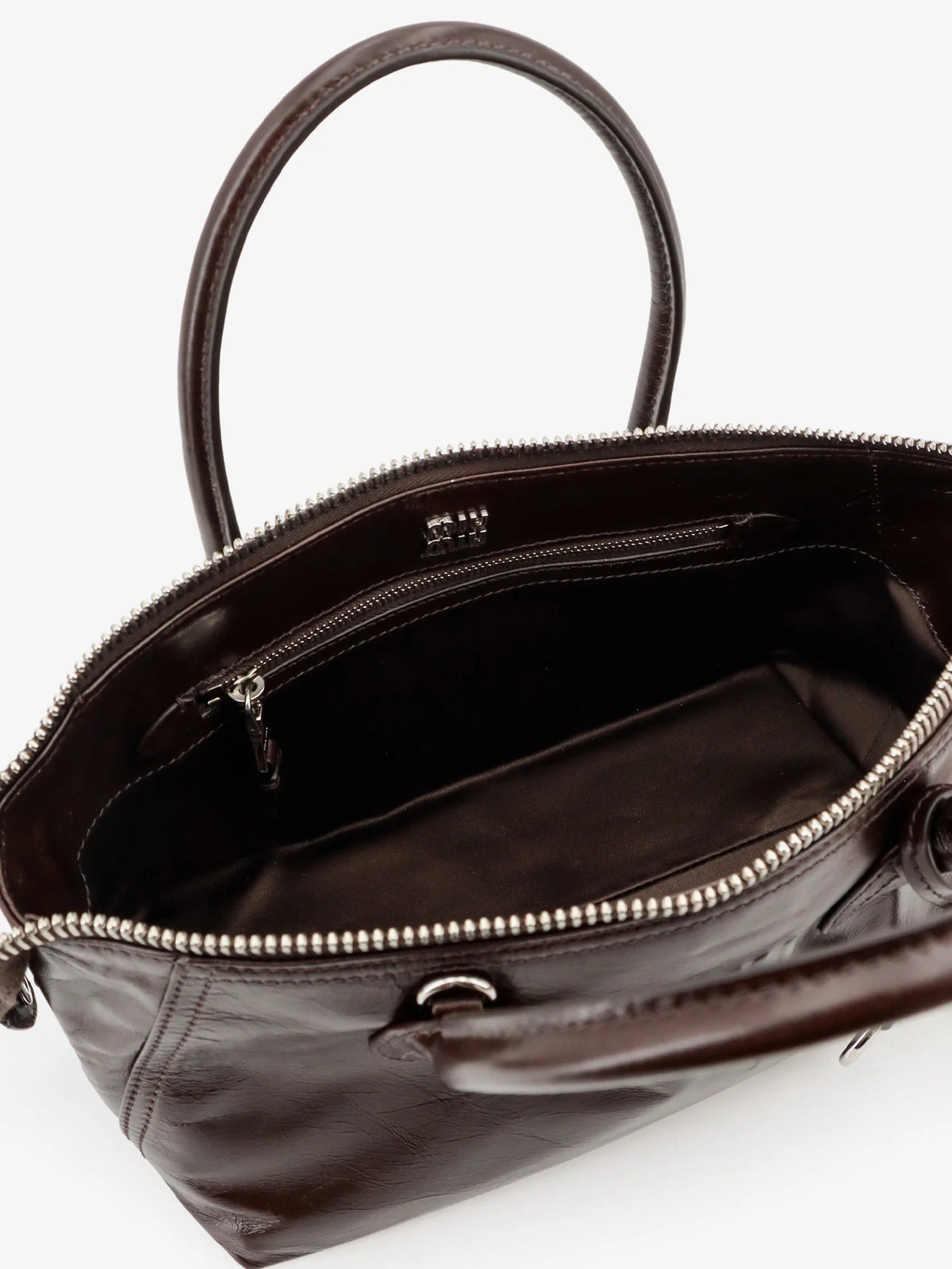 Leather handbag with embossed lettering logo