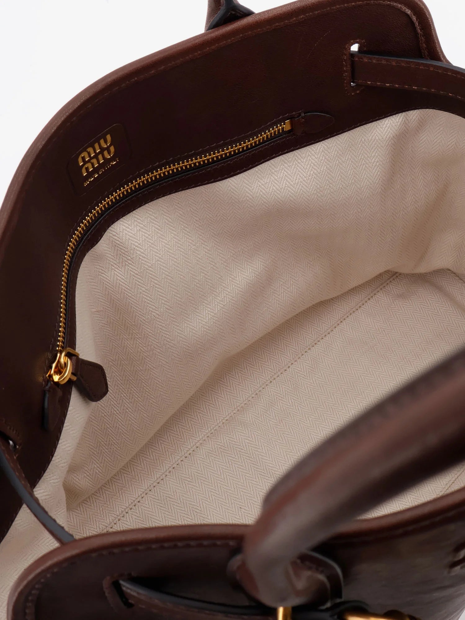 Aventure leather handbag with front lettering logo