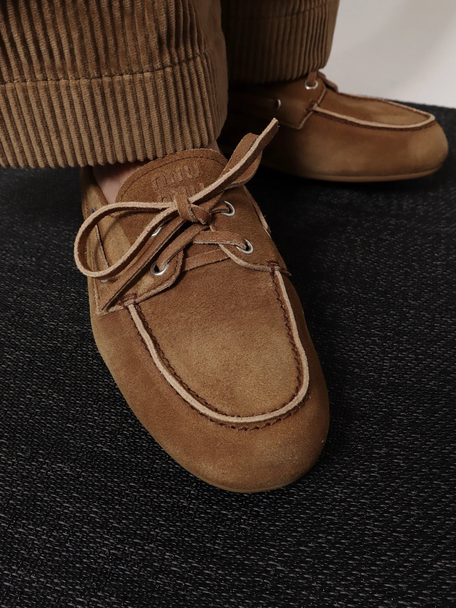 Suede loafers with embroidered logo