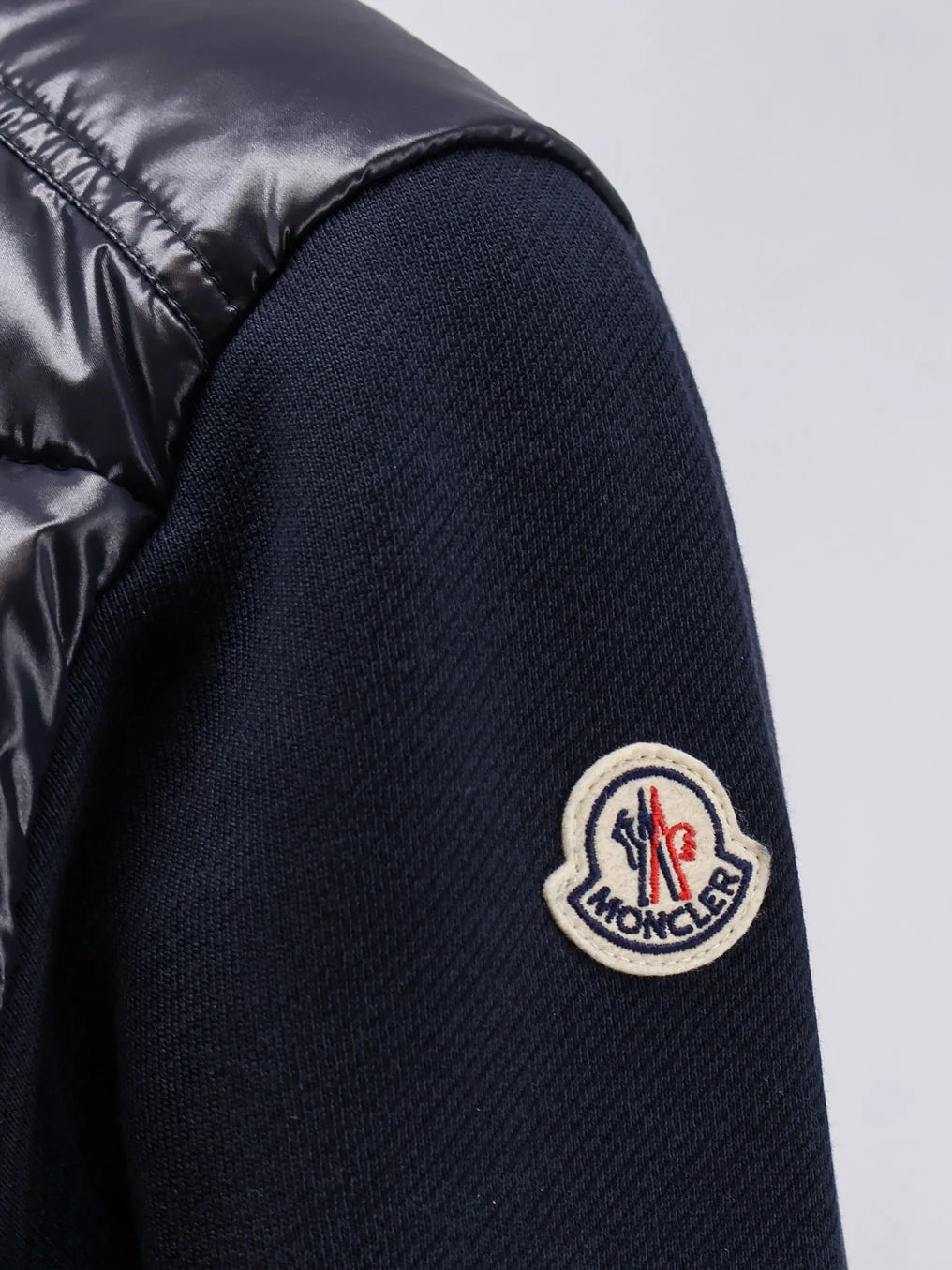 Padded jacket with fabric details
