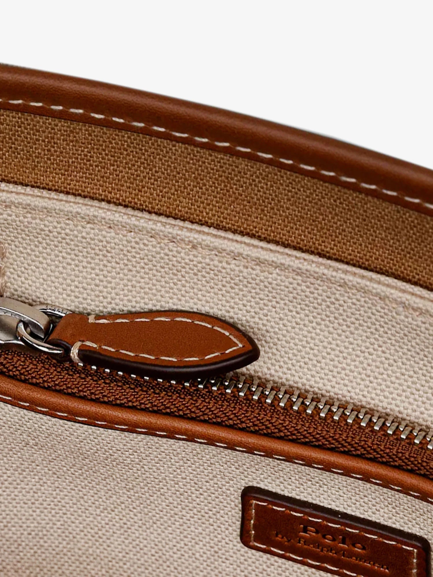 Canvas shoulder bag with embroidered logo on the front