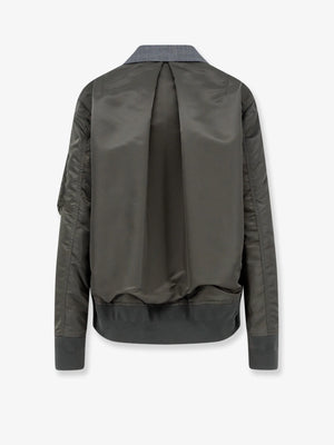 Wool blazer with nylon sleeves