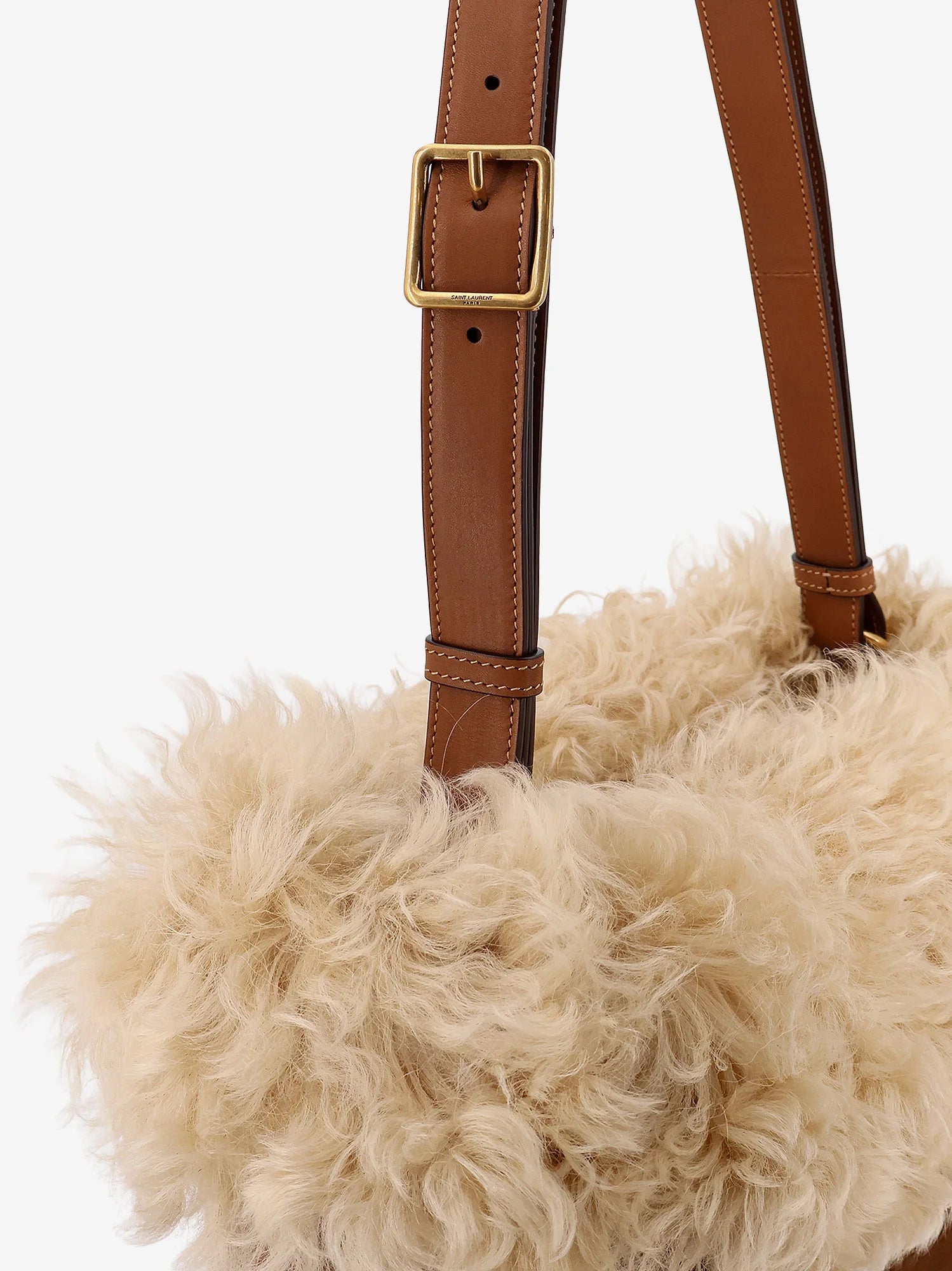 Suede shoulder bag with shearling profile