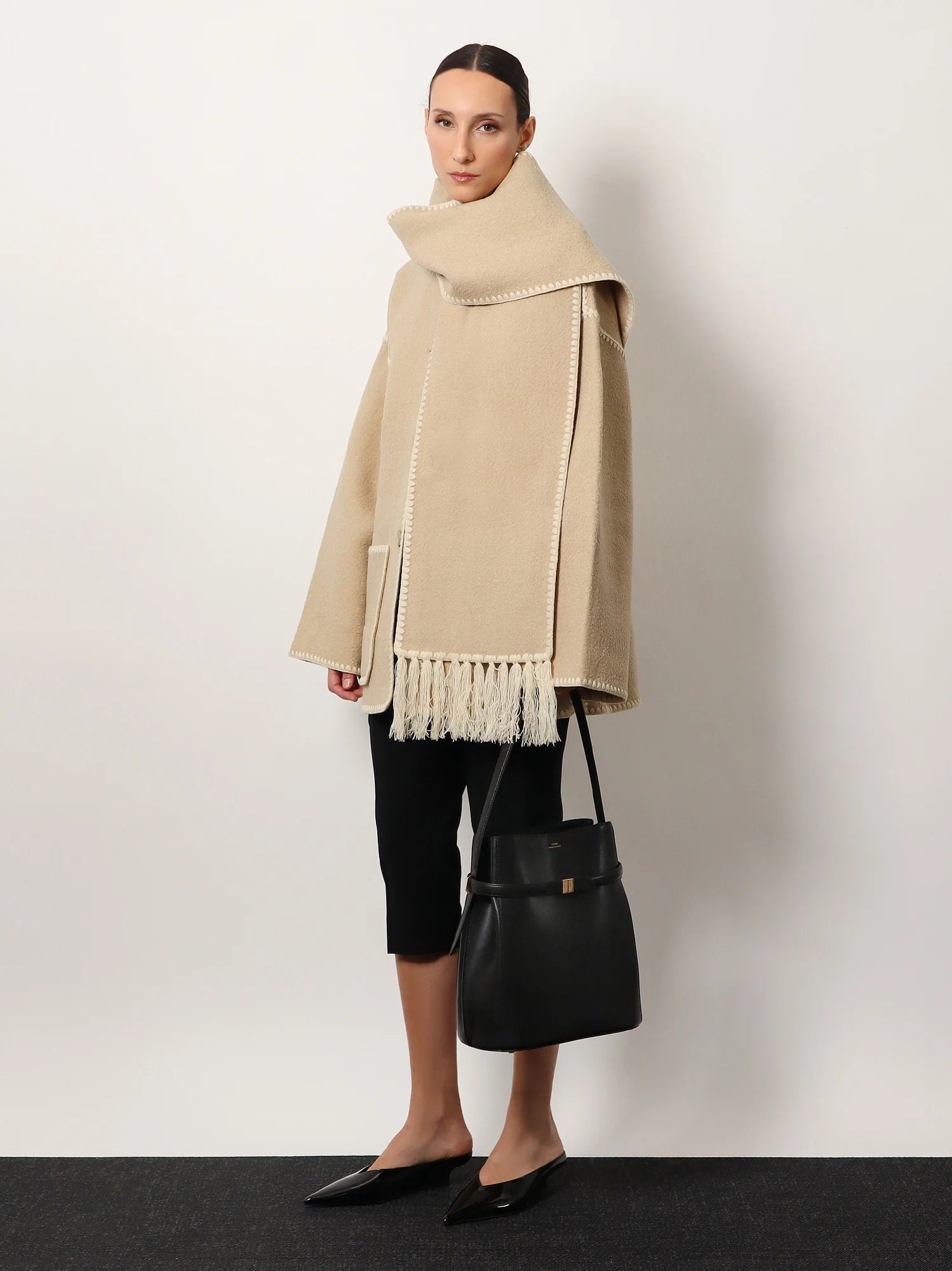 Belted leather bucket bag