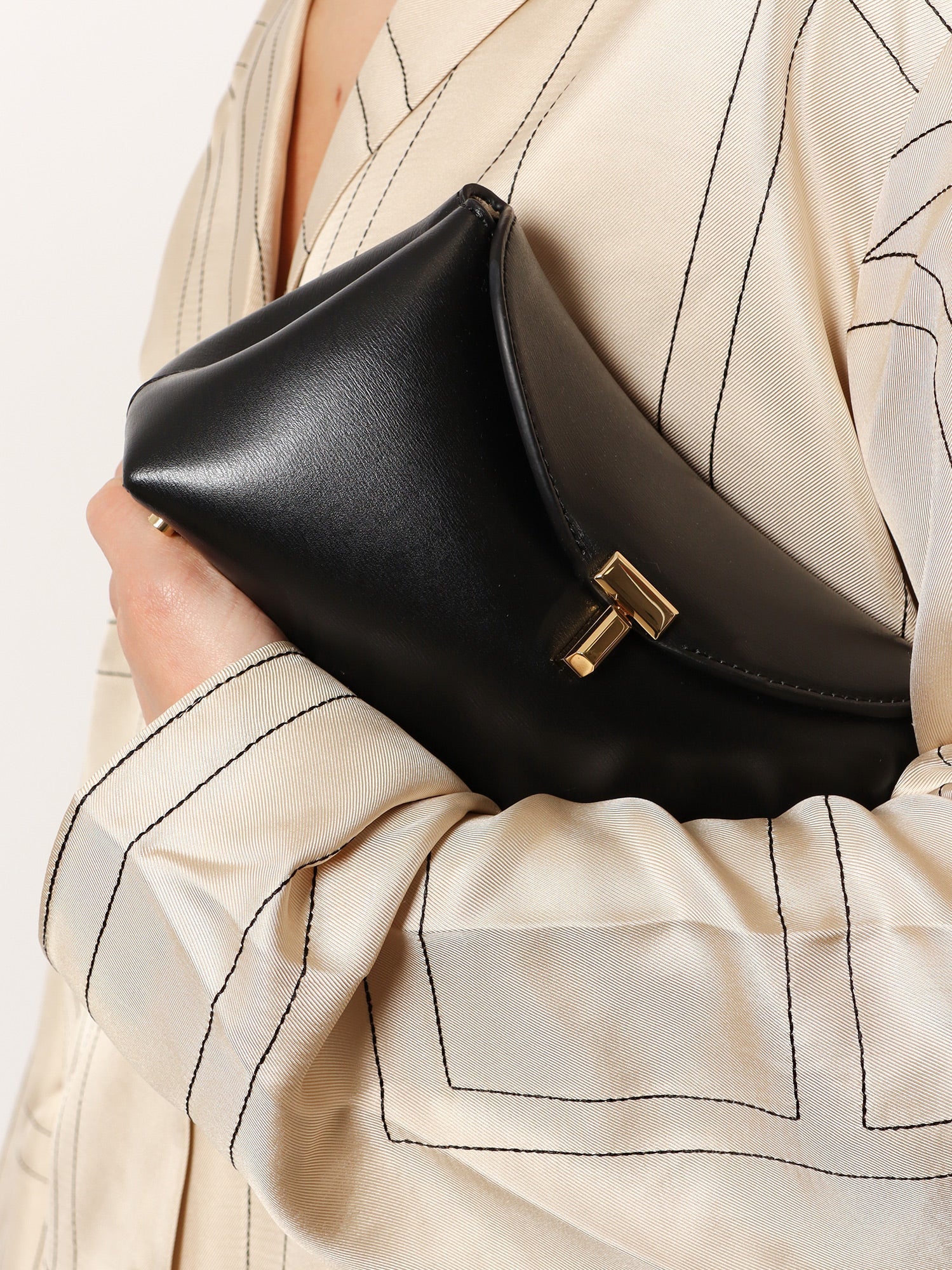 Mini T-Lock leather clutch